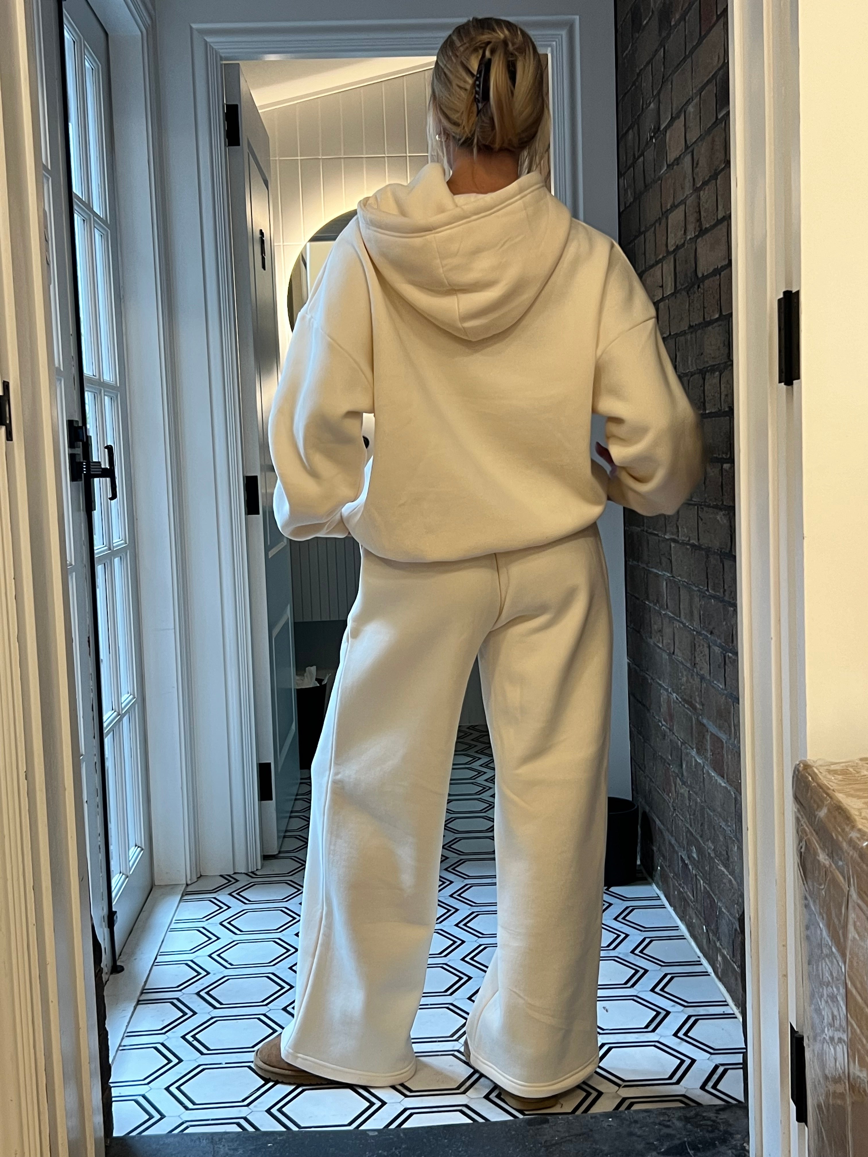 Buttercream trackies, buttercream trackpant, cream trackies, cream and pink trackies, baby pink trackies, comfy trackies, wide leg trackies, flare leg trackies, flare trackies, flare trackpant, flare pants, baby pink flare trackies, tracksuit set, cream tracksuit set, comfy tracksuit set, oversized tracksuit set, baby pink track set, high quality tracksuit set, cream hood, cream and pink hoodie