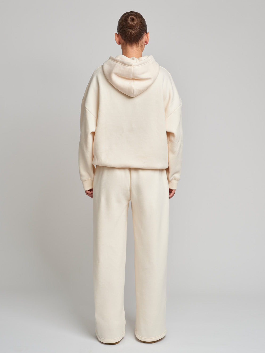 Buttercream trackies, buttercream trackpant, cream trackies, cream and pink trackies, baby pink trackies, comfy trackies, wide leg trackies, flare leg trackies, flare trackies, flare trackpant, flare pants, baby pink flare trackies, tracksuit set, cream tracksuit set, comfy tracksuit set, oversized tracksuit set, baby pink track set, high quality tracksuit set, cream hood, cream and pink hoodie